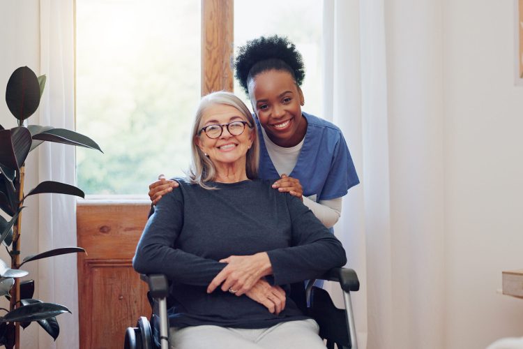 Senior care, nurse and old woman with wheelchair, portrait and smile in health at nursing home. Support, kindness and happy face of caregiver with elderly person with disability for homecare service